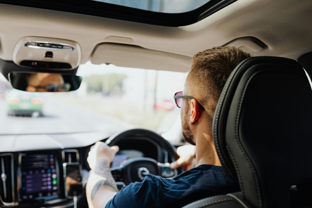Man driving a car